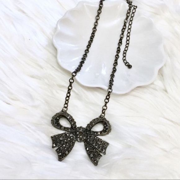 Poshmark @thegreycat Jewelry - Sweetheart bow rhinestone metal statement necklace